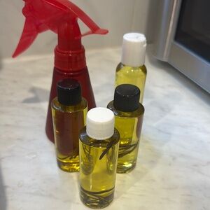 Set of Hair Care Oils with Red Spray Bottle